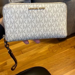 Michael Kors Wrislet with phone holder *very gently used*